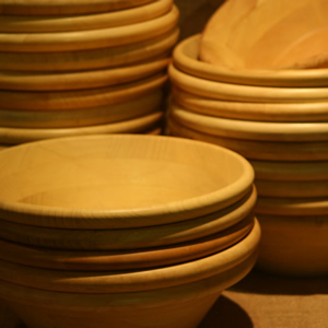 Stacks of large wooden bowls