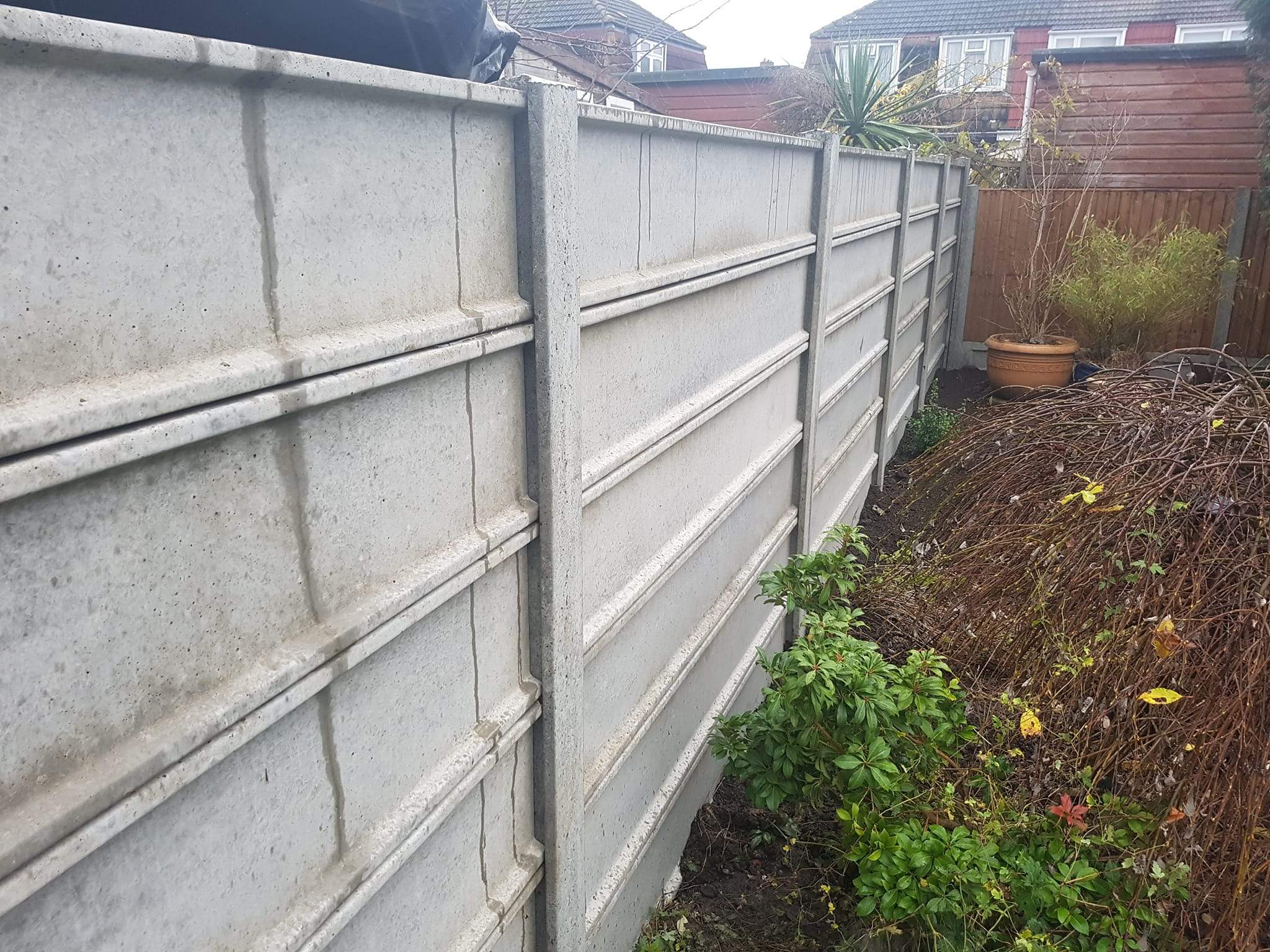 wall of concrete, fencing installed in Isle of Grainf