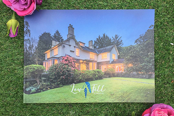 Low Fell Bespoke Brochure Design with Lilac/Blue Foiled Logo.