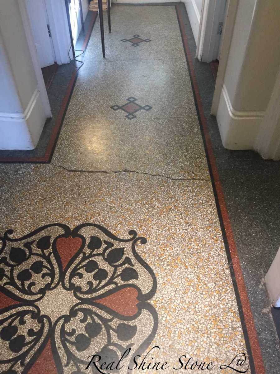 Terrazzo floor before restoration and crack repairs