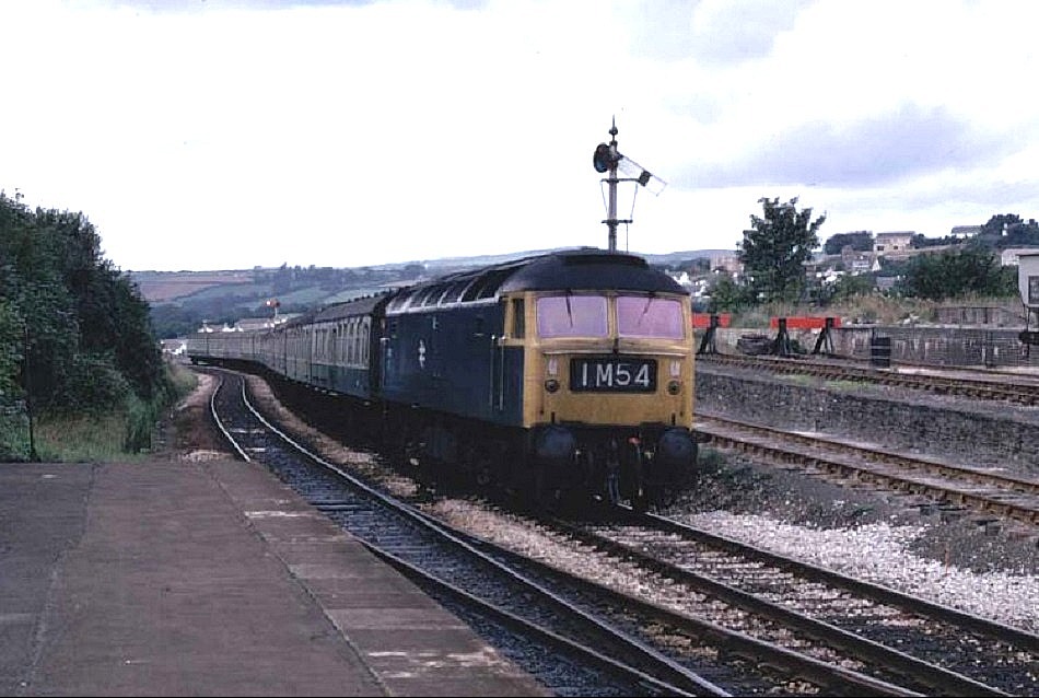 47105 arriving at Liskeard -  1M54 1205 Newquay - Nottingham 6 Sept 1975

(R Geach)