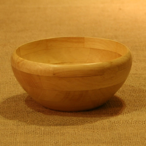 Wooden bowl on hessian