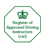 Green on white octagonal badge of the register of DVSA Approved Driving Instructors