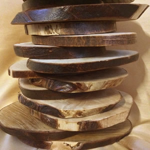 Stacked Rustic round platters, show how each one is unique
