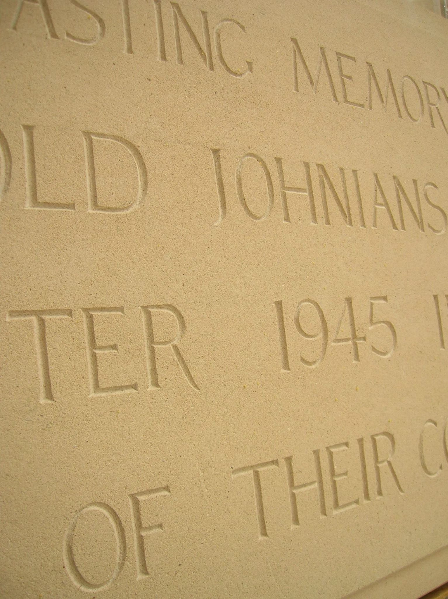 Close up of lettering of tablet.