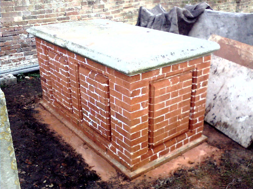 Brick tomb before being rubbed down to finish