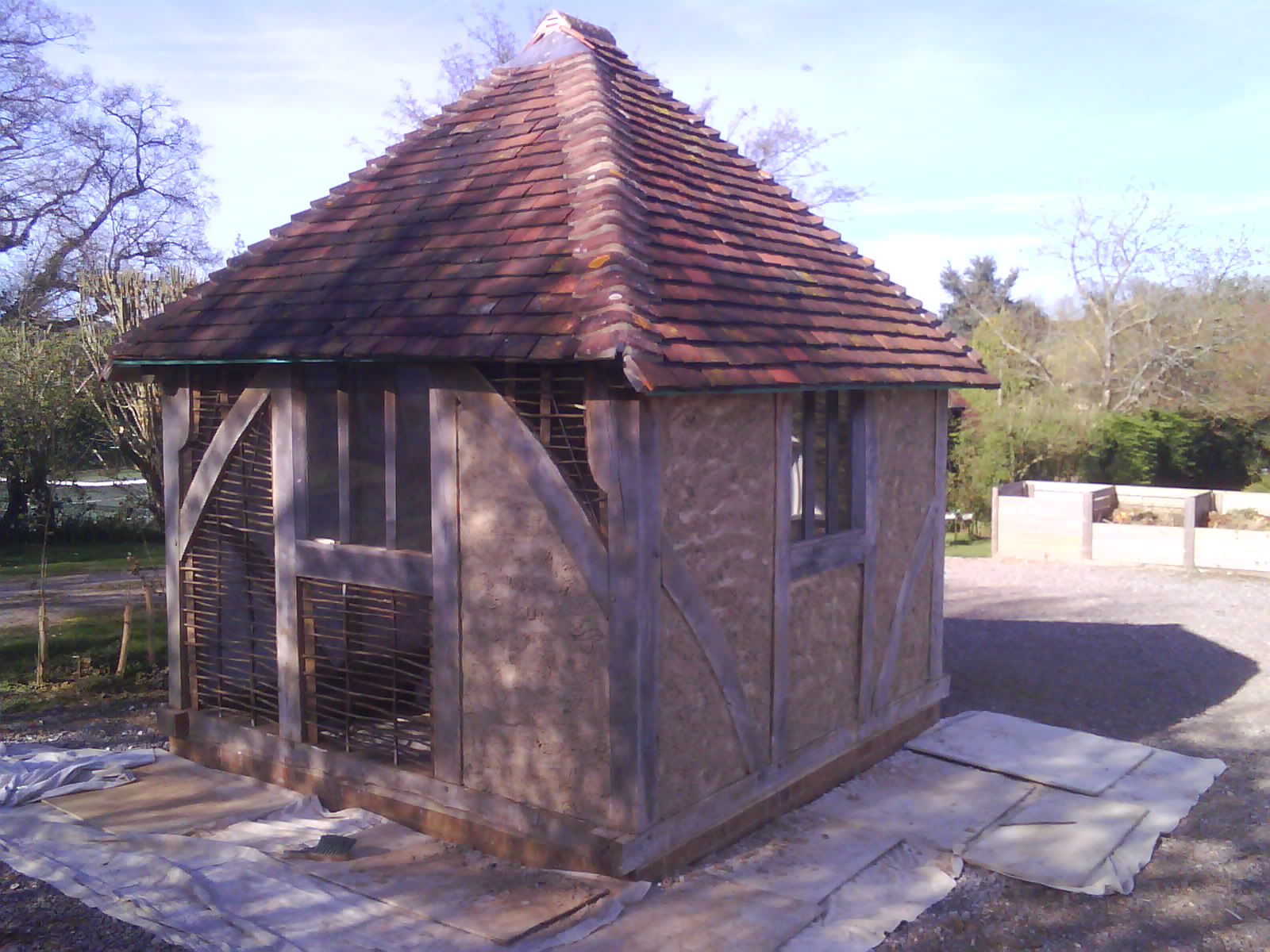 Timber shed in grounds of private house near East Tisted.