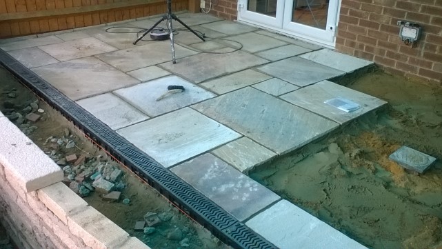 Natural sandstone laid on solid sub base