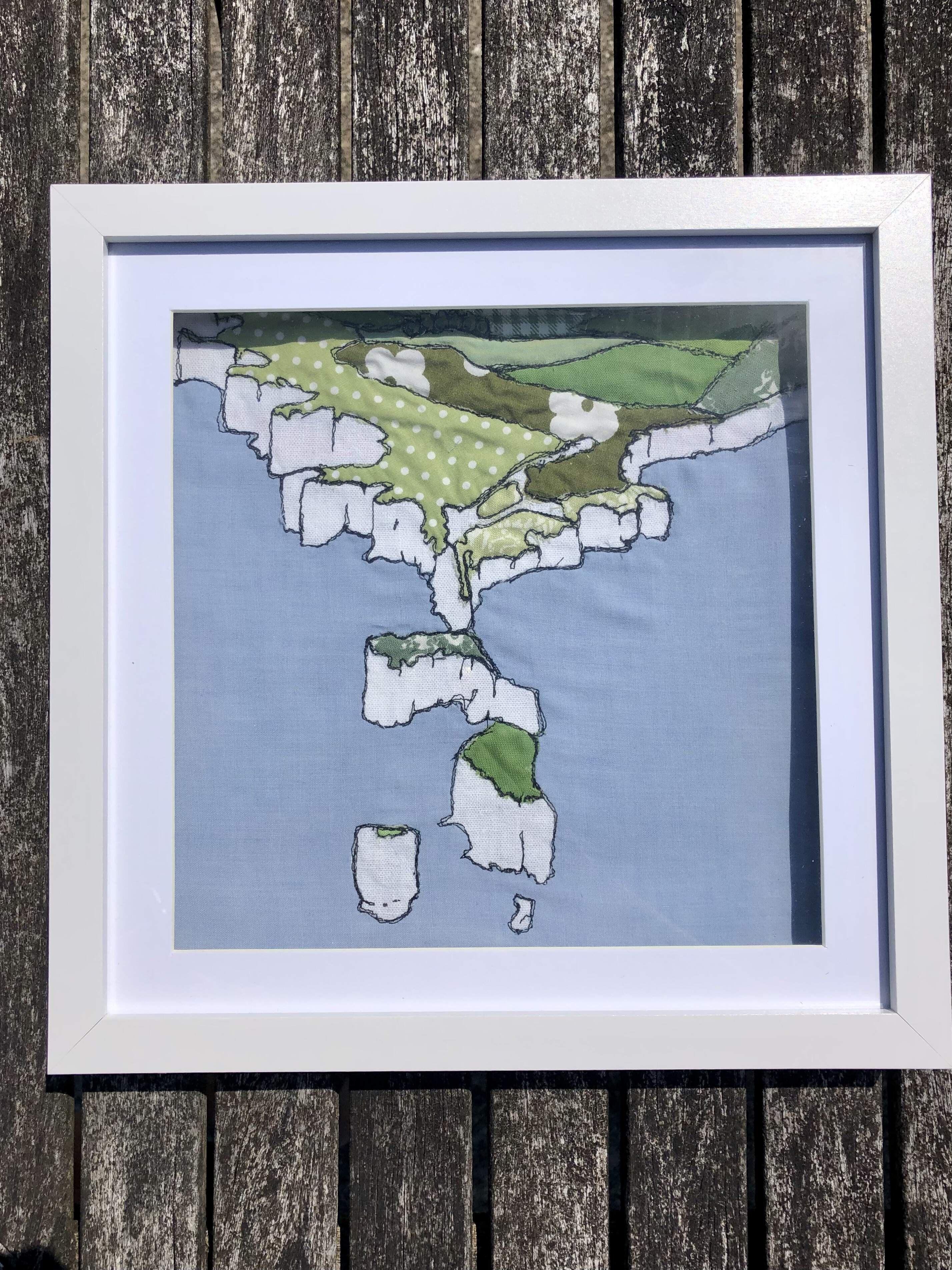 Dorset coast created using fabric, thread and love
