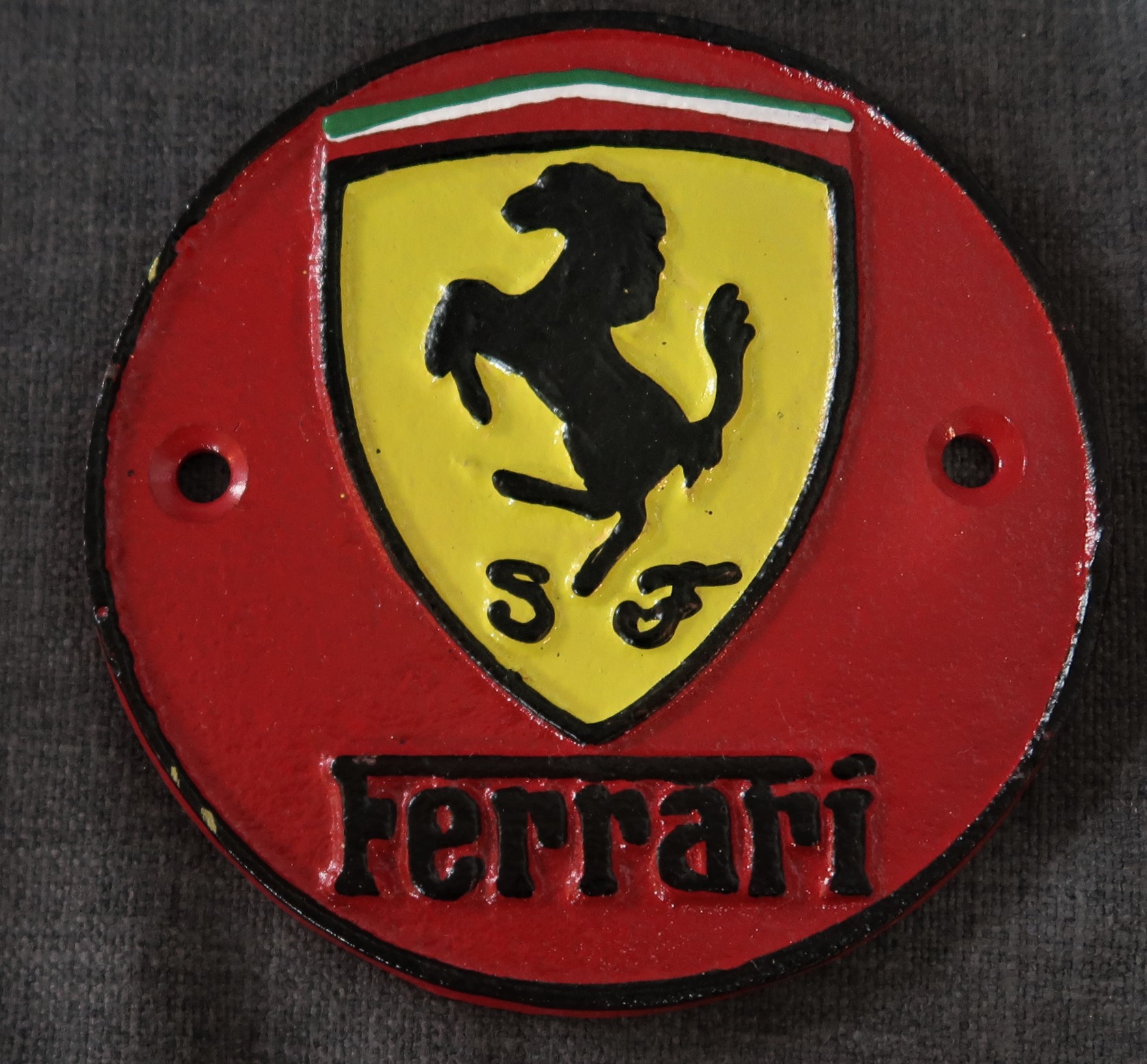 Cast iron mini plaque with Ferrari.