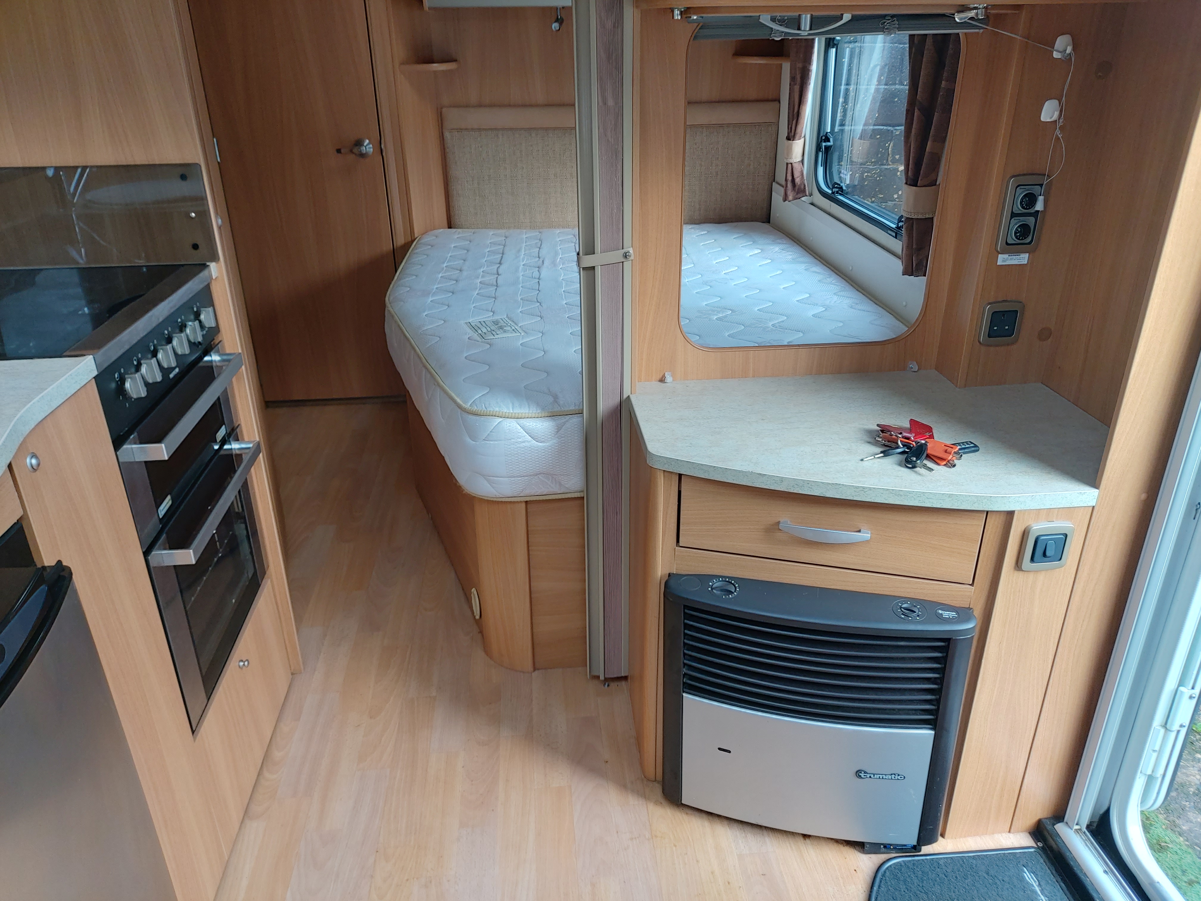2010 Swift Corniche 19-4  4 Berth Fixed Bed End Washroom Caravan, Motor Mover