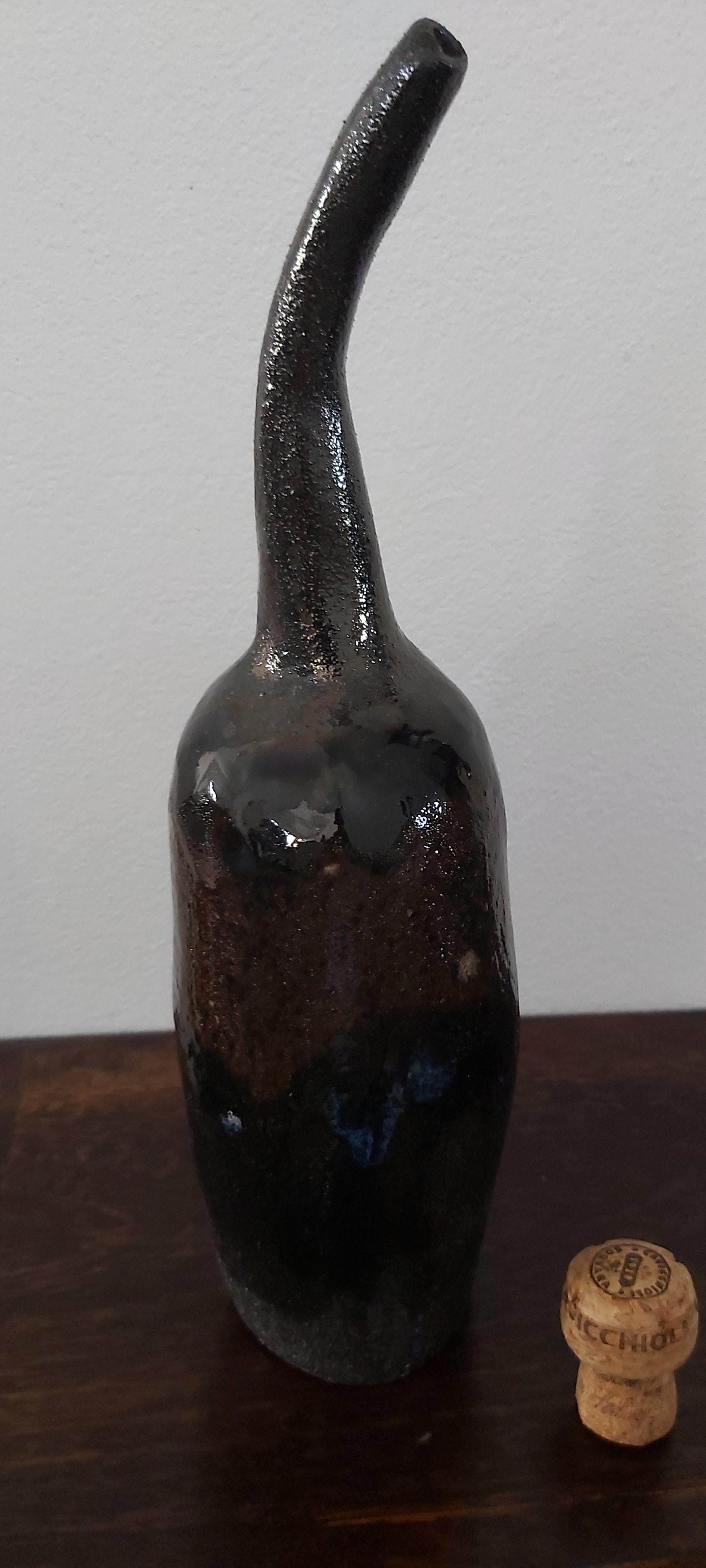 Chocolate brown clay bottle