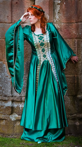Green dress modelled by a auburn haired lady
