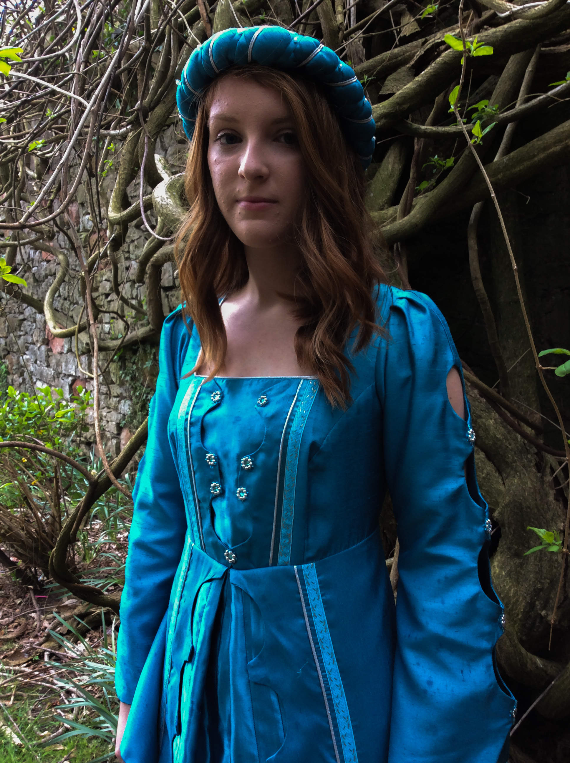 Turquoise medieval gown with square neckline