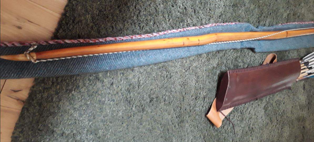 Single piece (not mitred in the middle) English self Yew Longbow with antler horn knocks