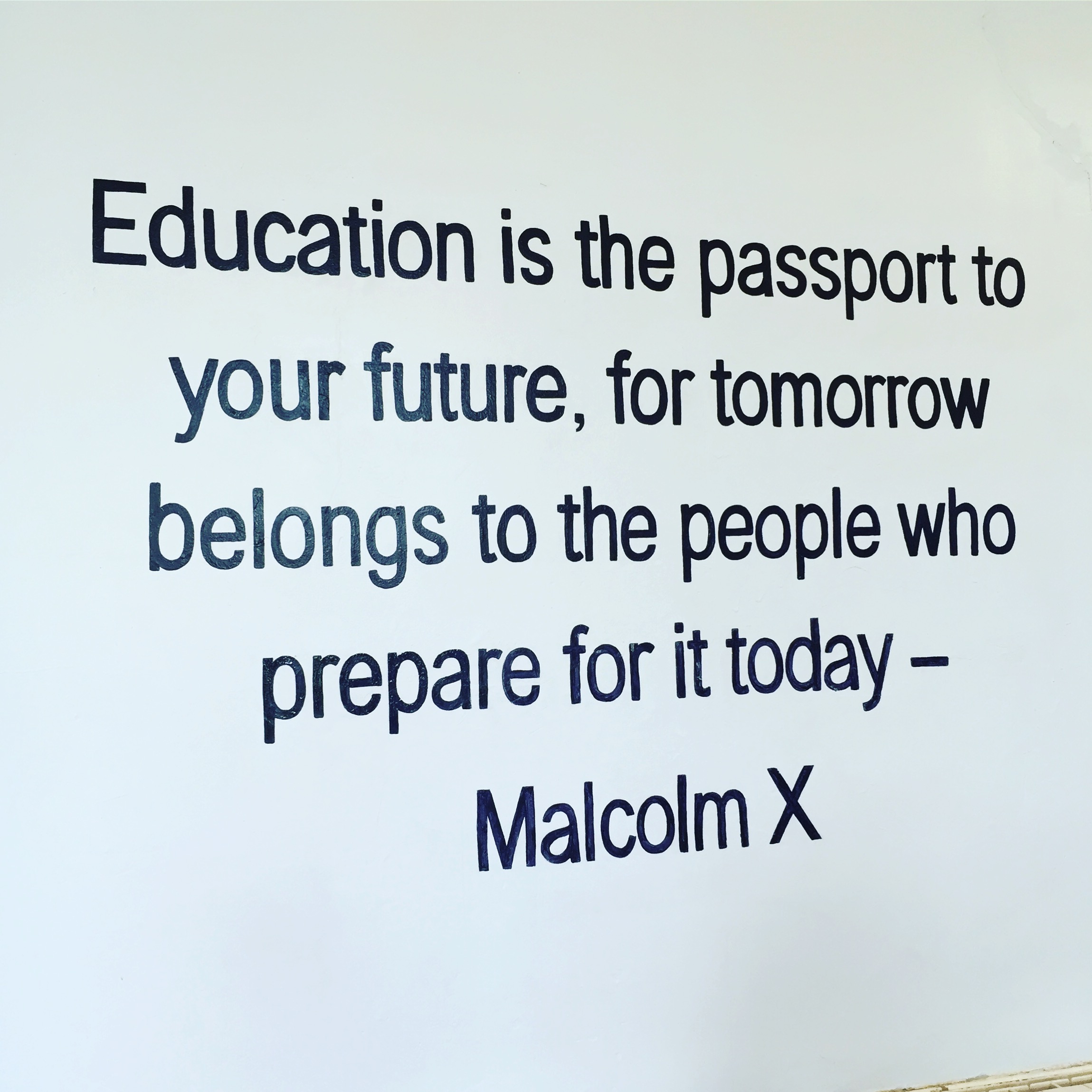 Educational quote painted to inspire students in a secondary school