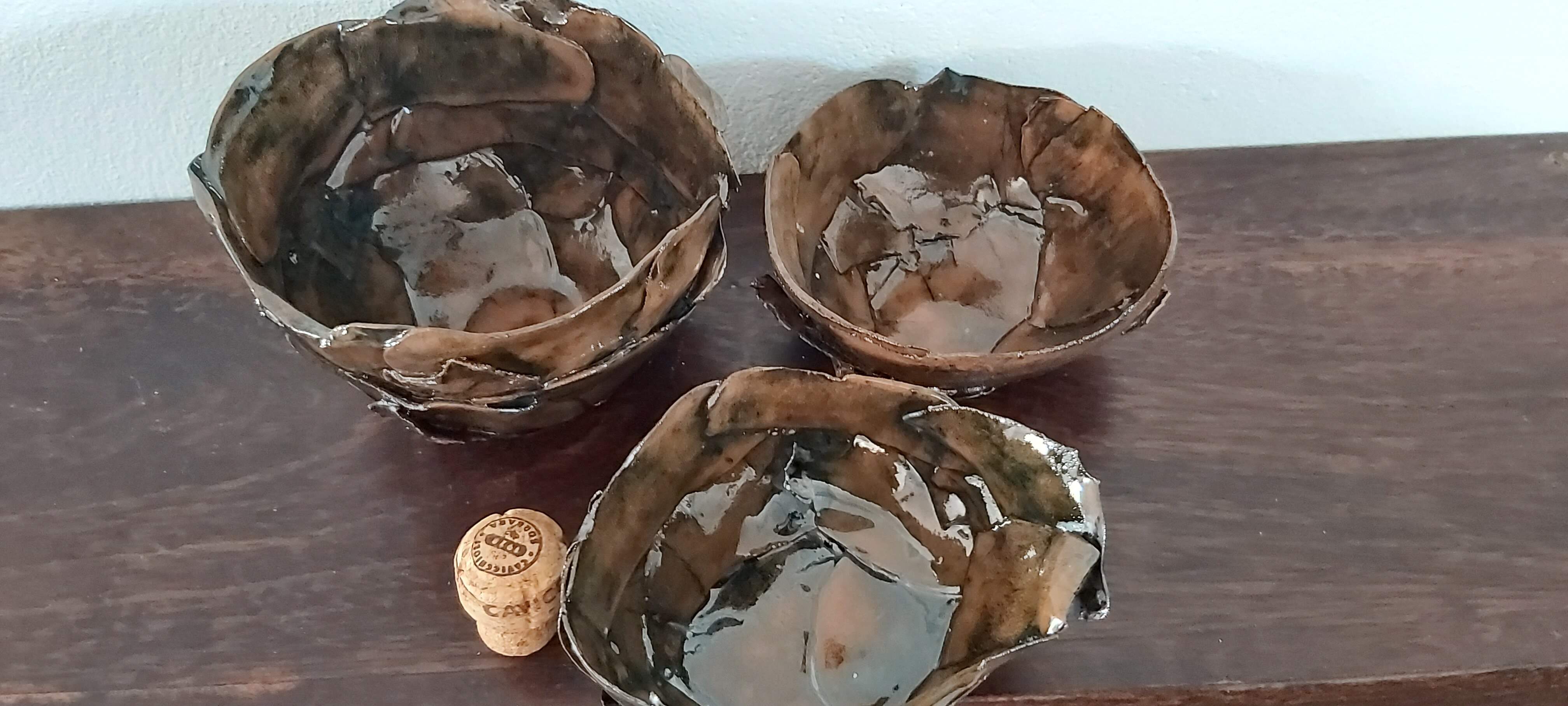 Set of three terracotta bowls