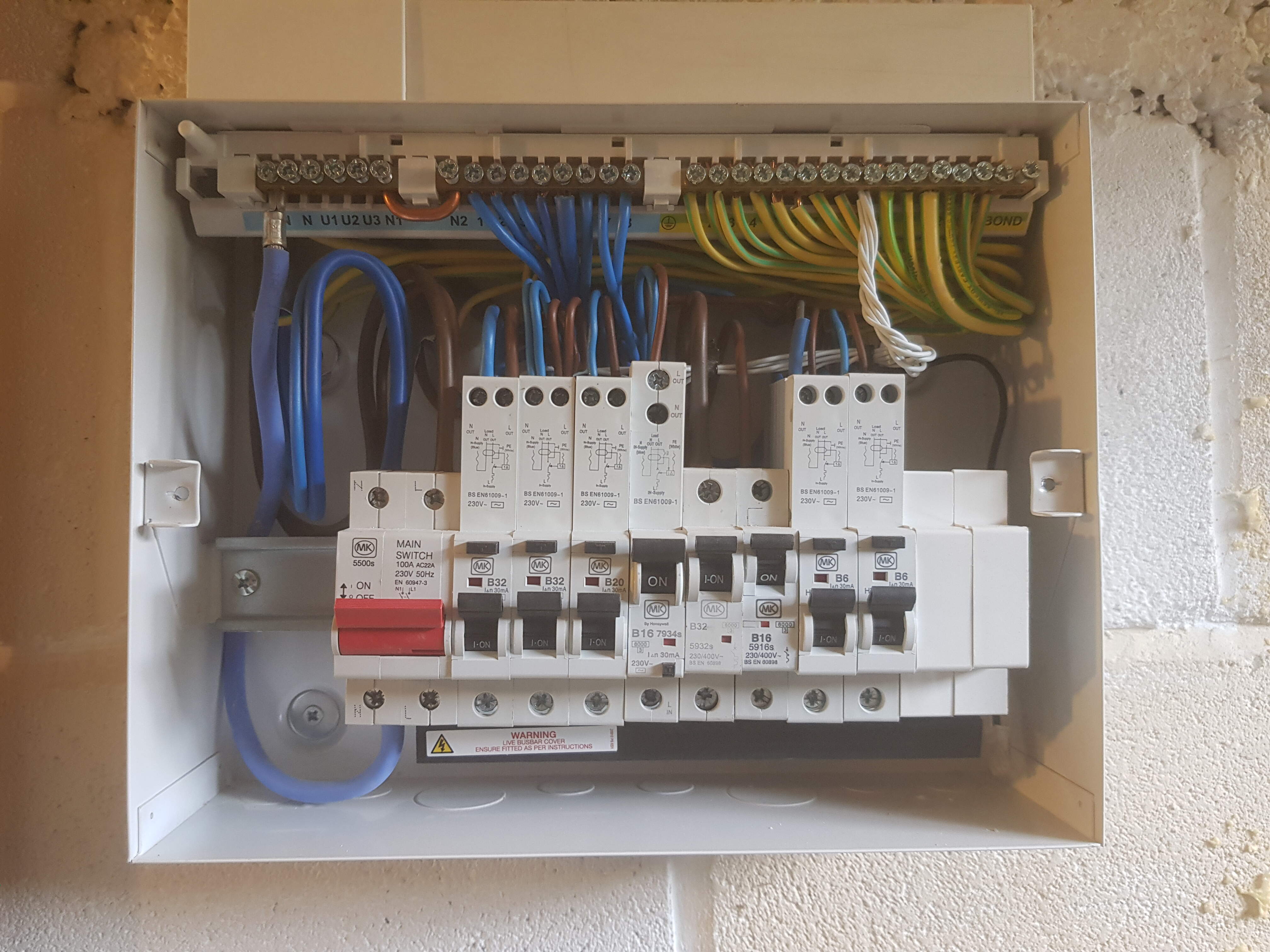 Sub-main from intake to new consumer unit supplying building extension & outbuildings