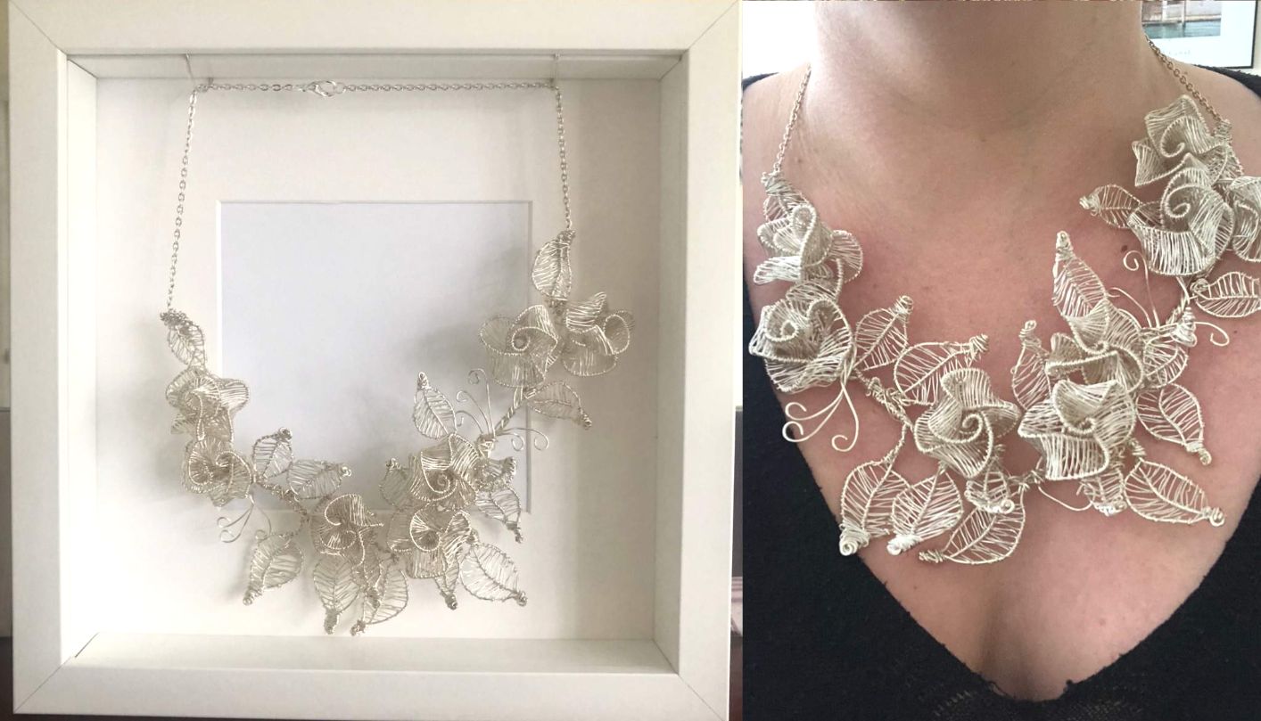 Custom Made Wearable Art Necklace made from silver wire wrapped roses with leaves - hung in a frame when not being worn