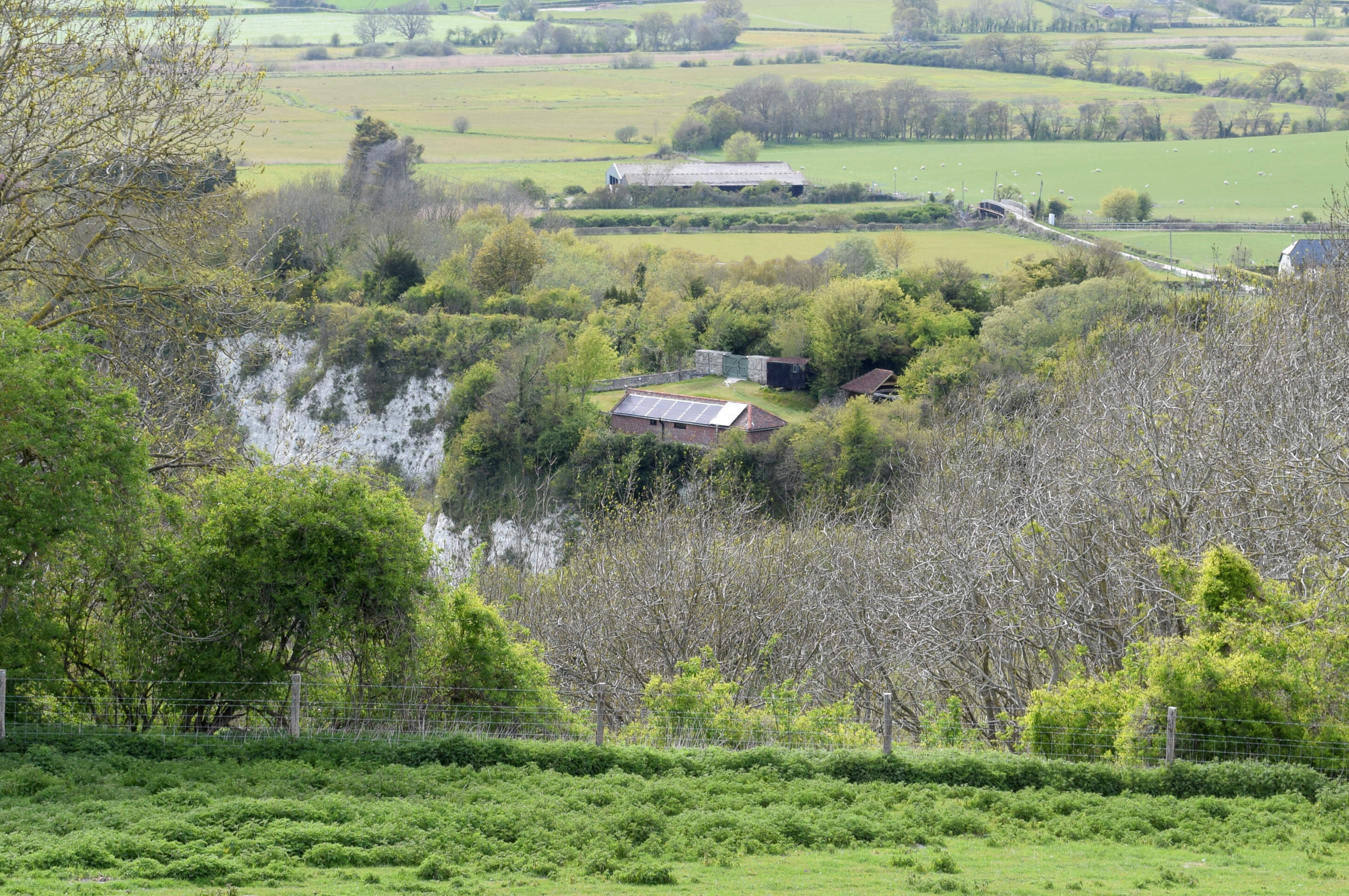 A view of Upper Barn showing it's rural and private location high above the Arun valley.