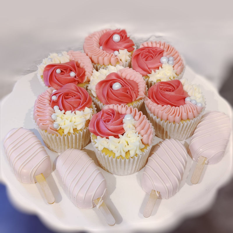 Bespoke cupcake selection with cake lollipops