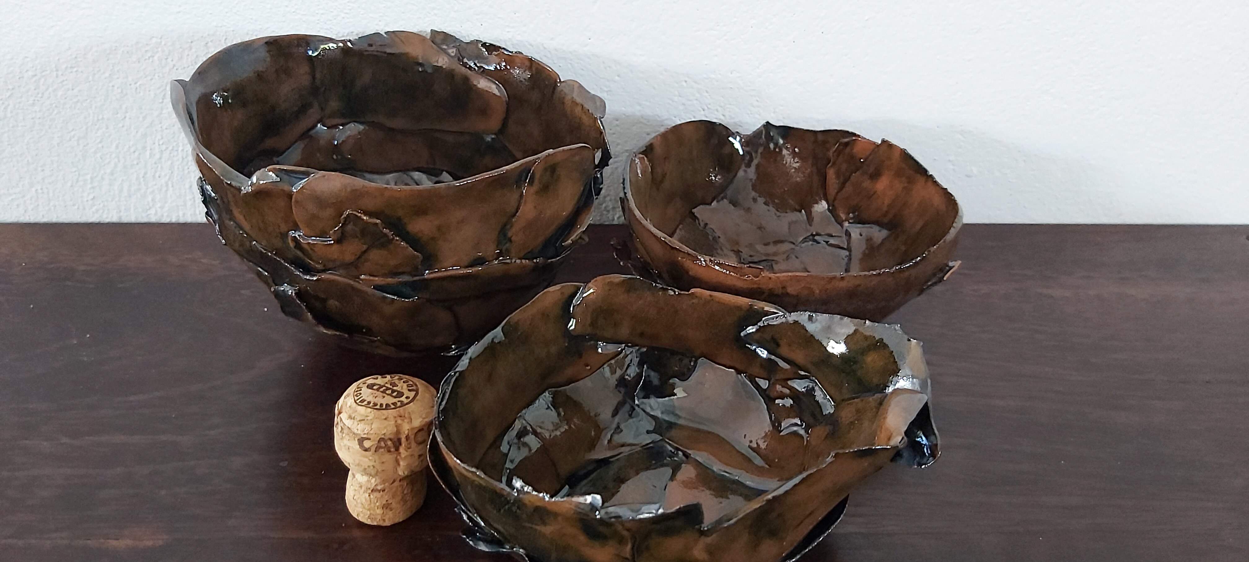 Set of three terracotta bowls