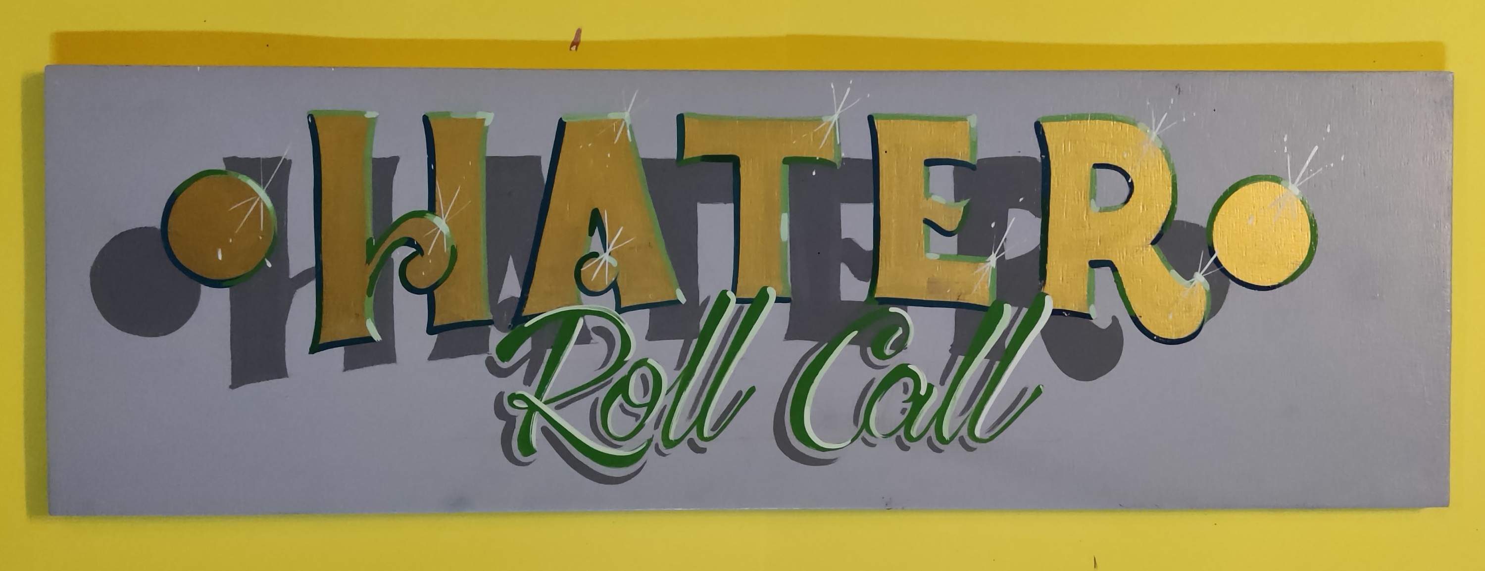'Hater Roll Call' faux-relief metallic enamel wooden panel. 60x22cm