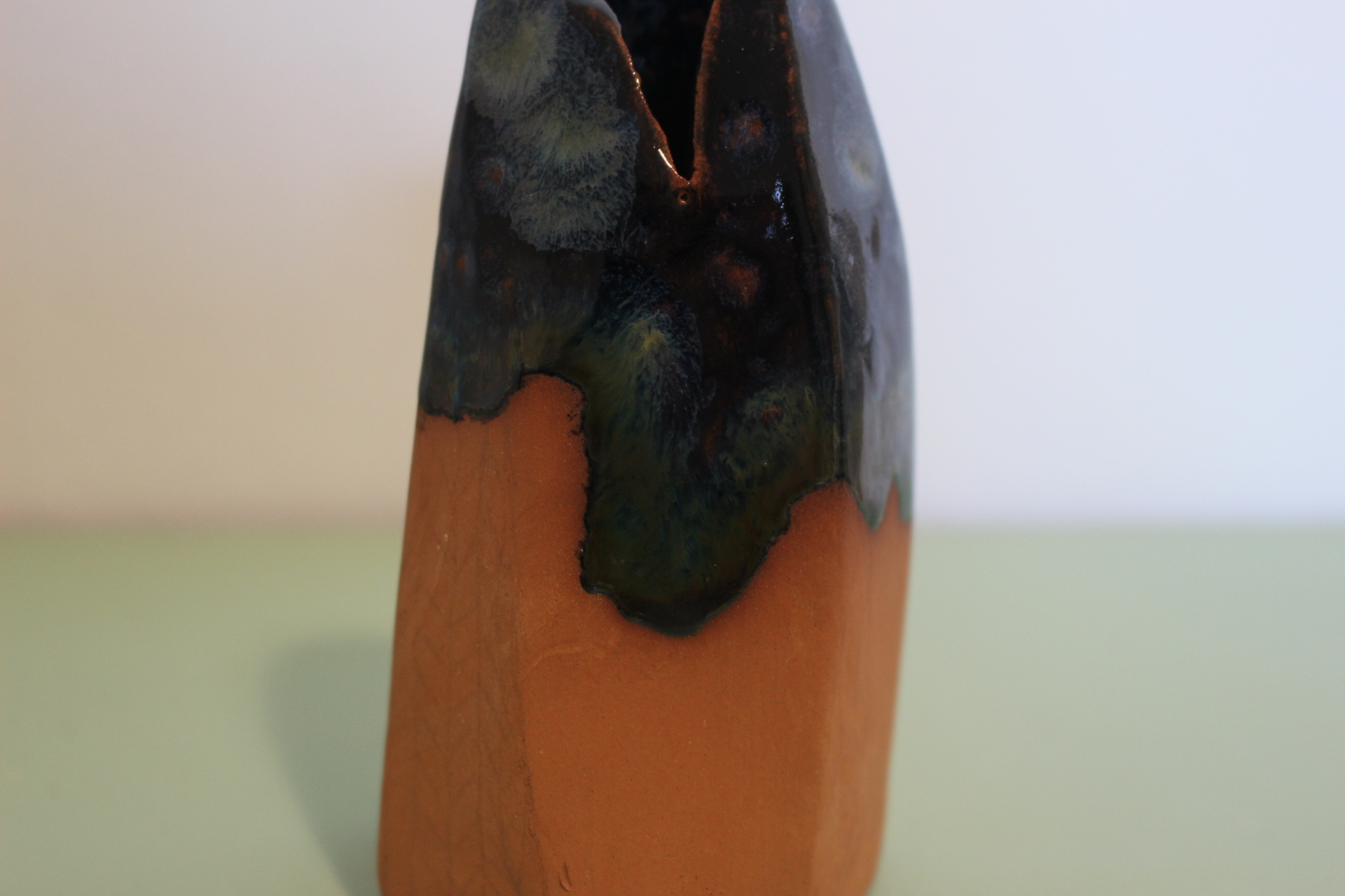 Small terracotta vase with blue crystal glaze