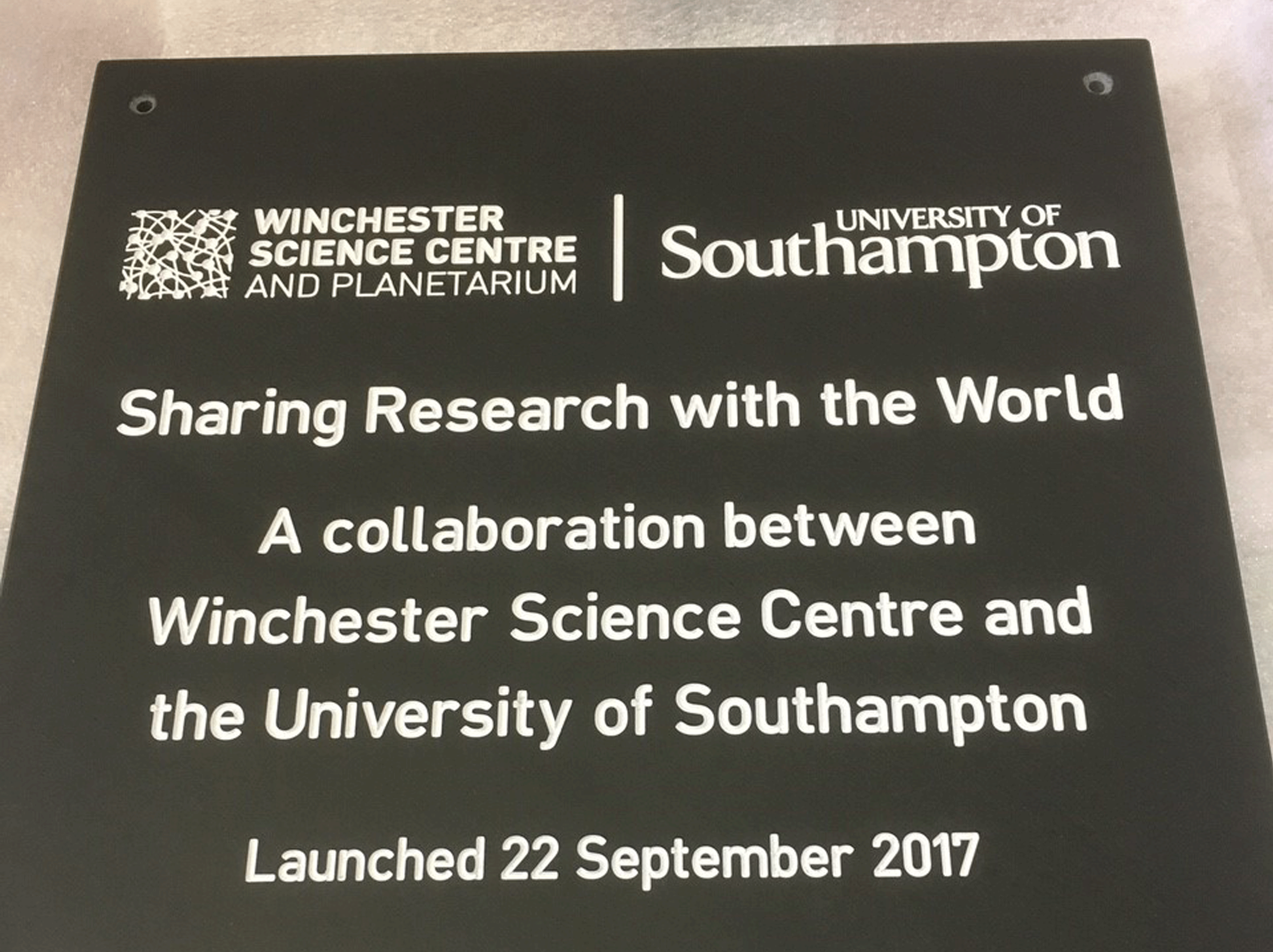 Slate sign engraved and filled white for the university of southampton and winchester science centre and planetarium collaboration