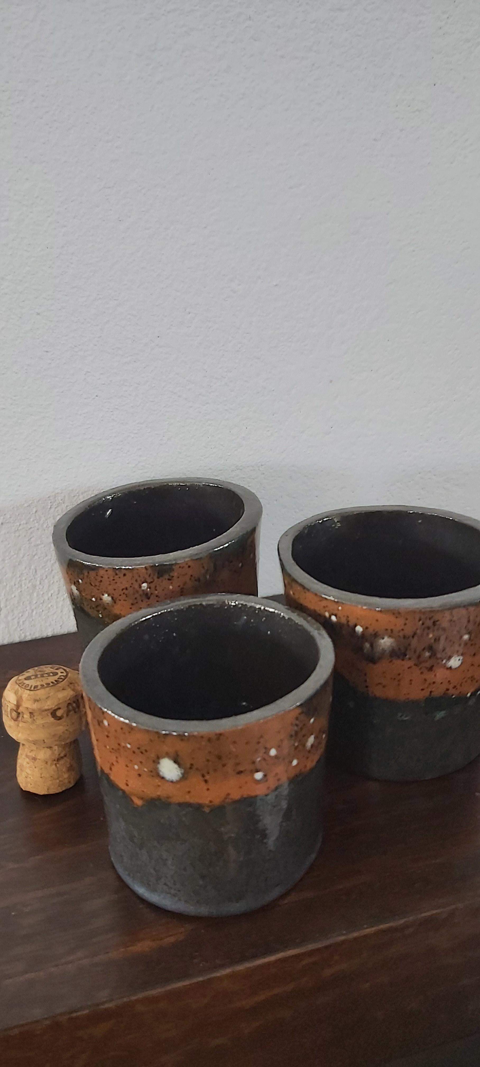 Set of three terracotta pots