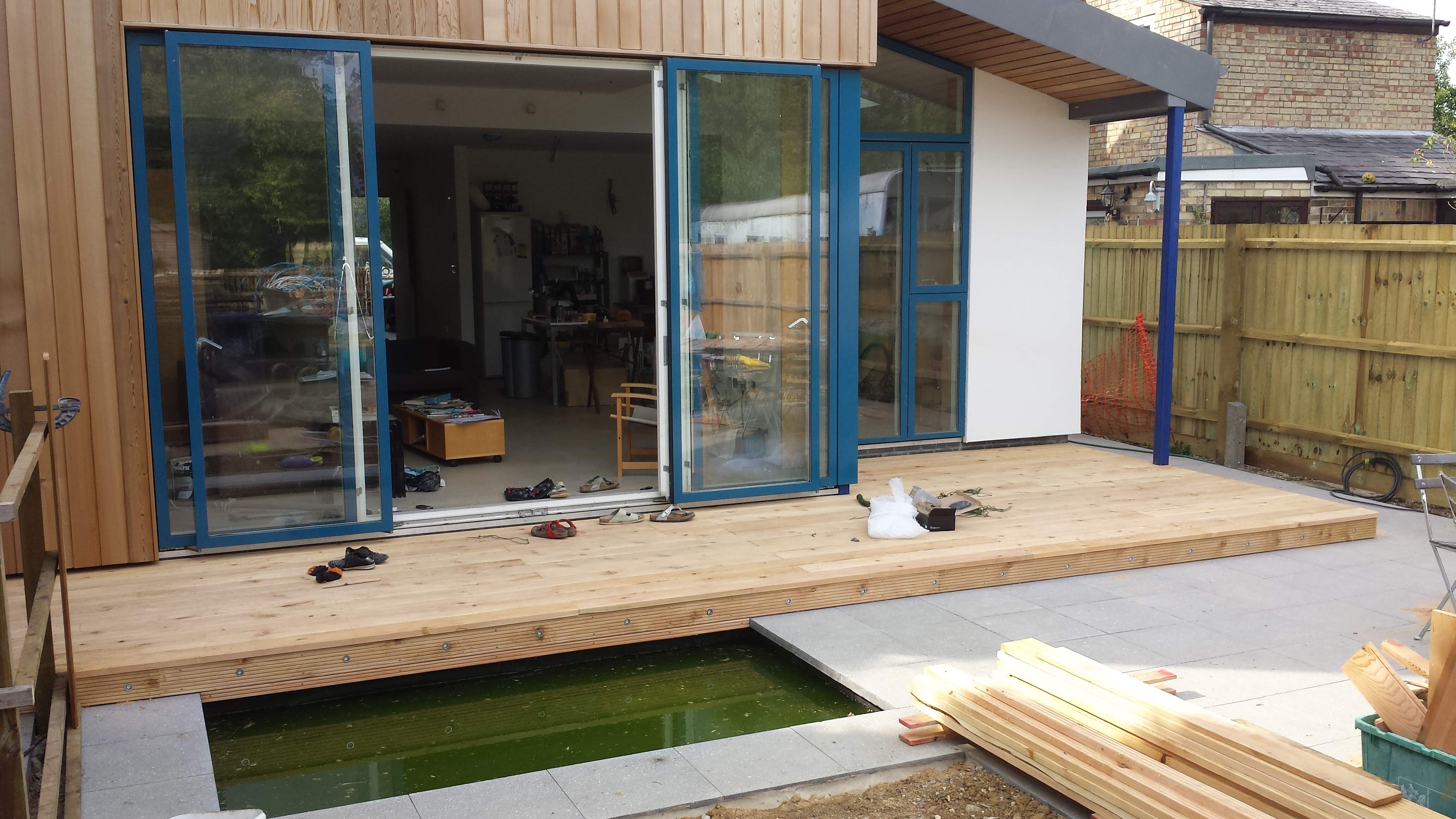 Slabs, decking and a pond!