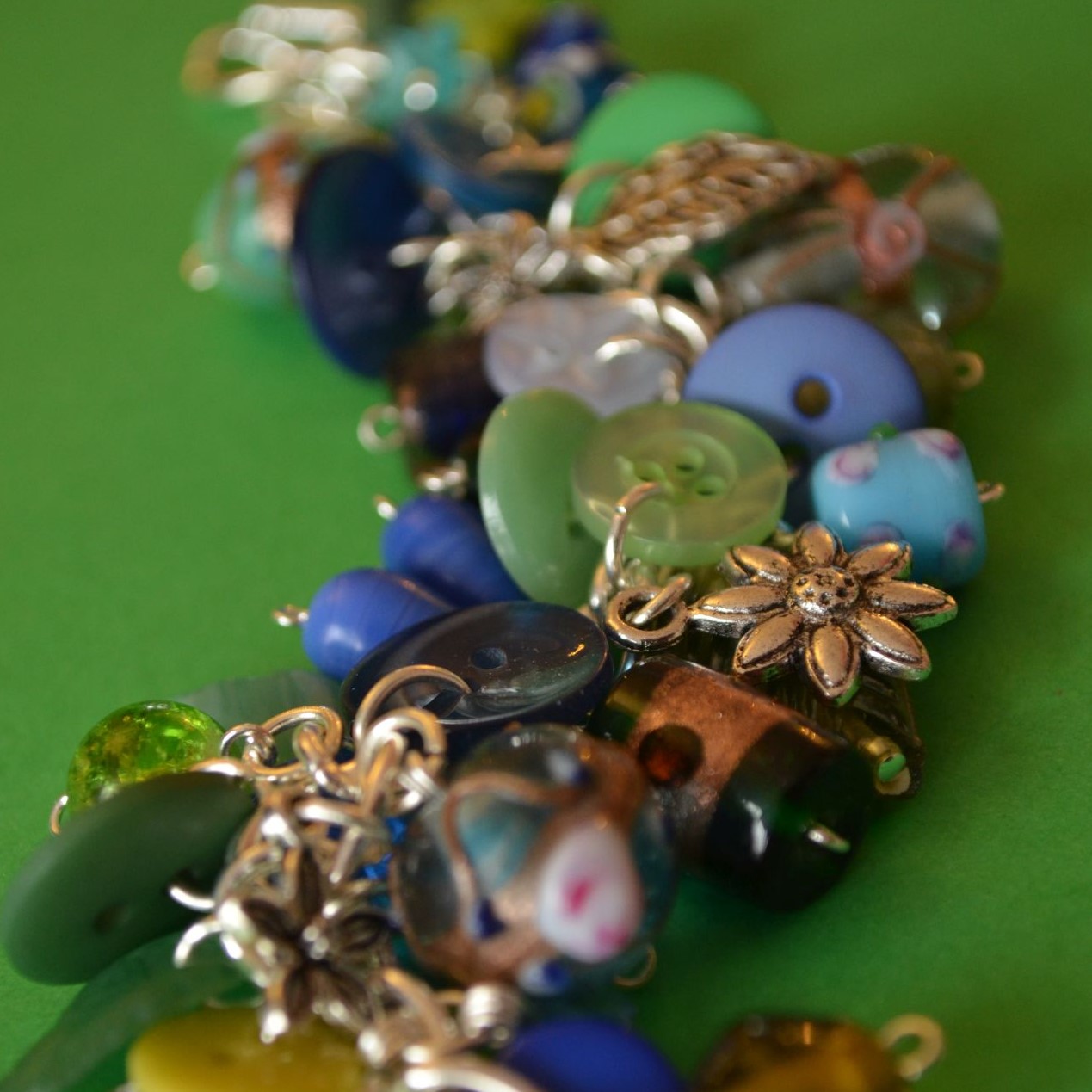 Button, Bead & Flowers Charm Bracelet