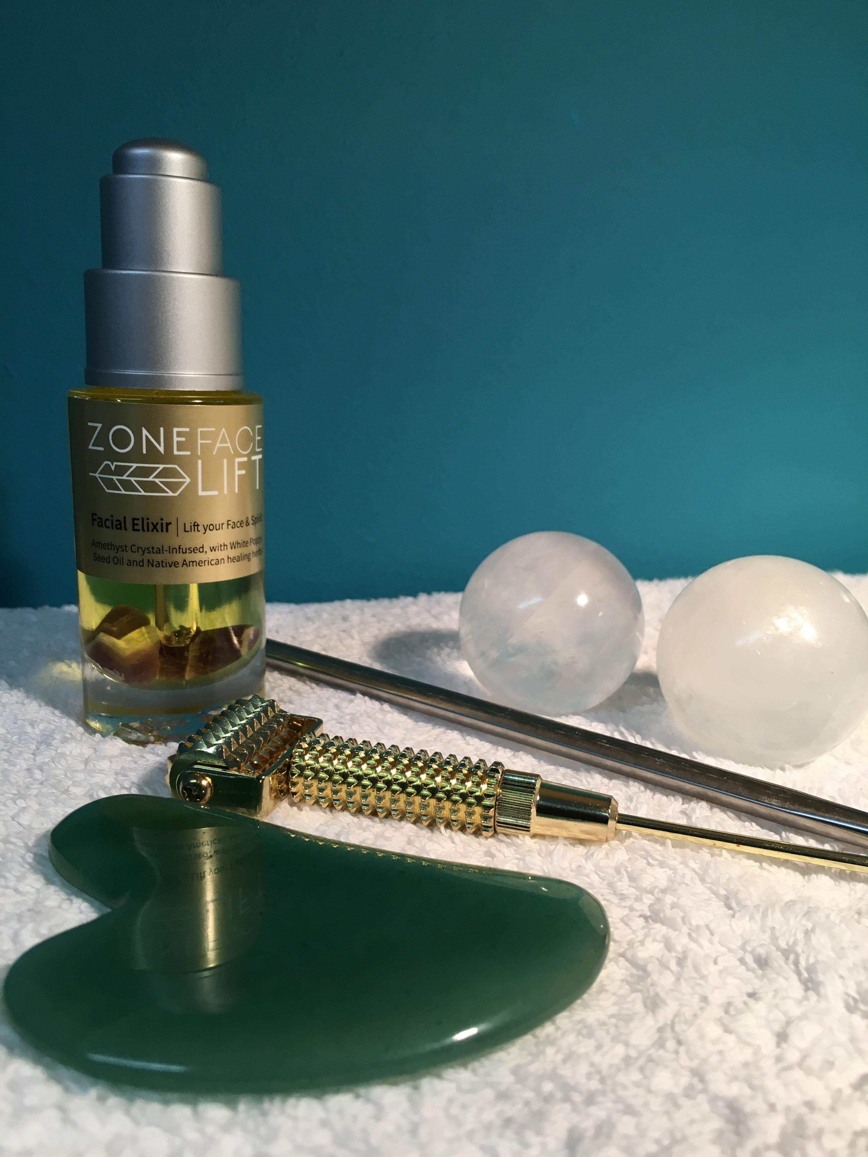 Gua sha and other facial reflexology tools with Zone Face Lift Elixir