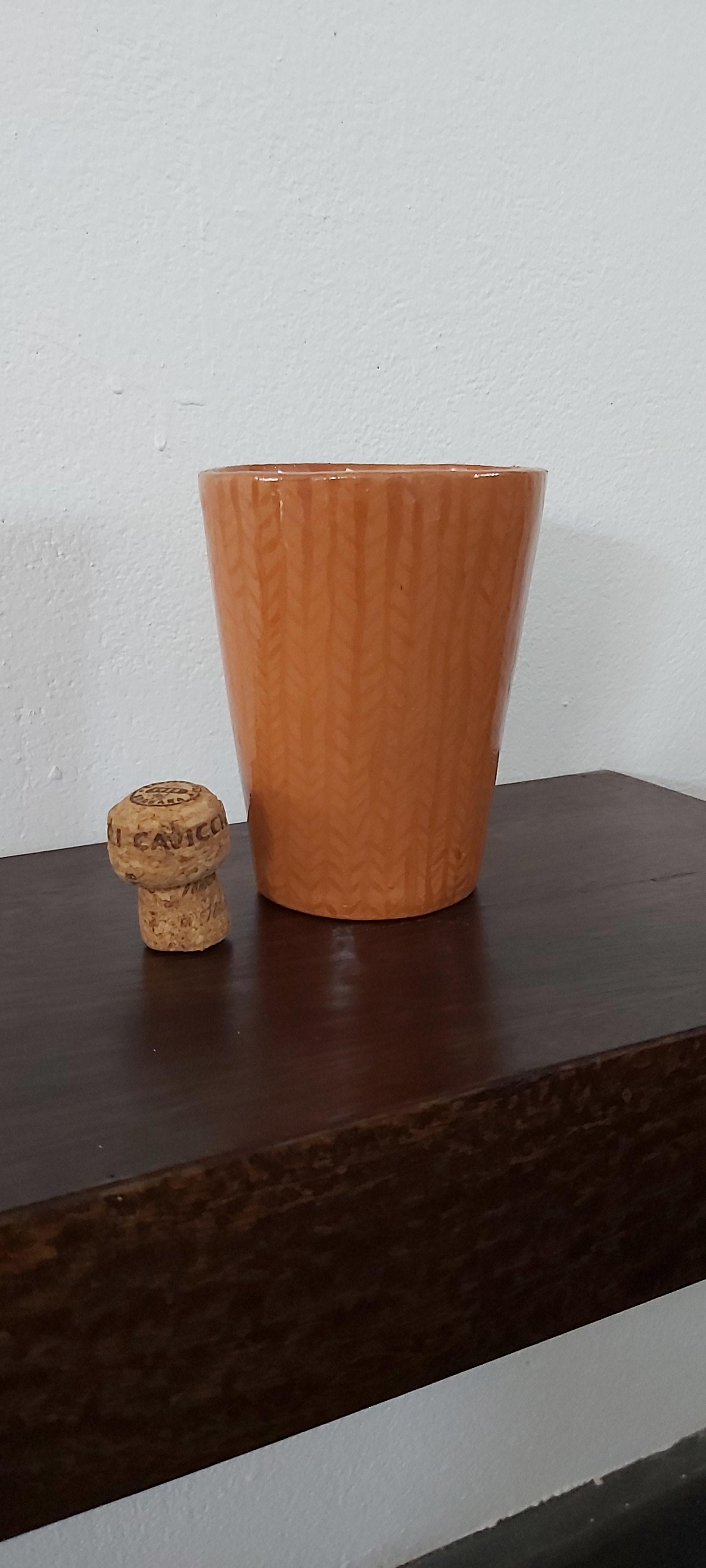 Individual terracotta beaker/vase