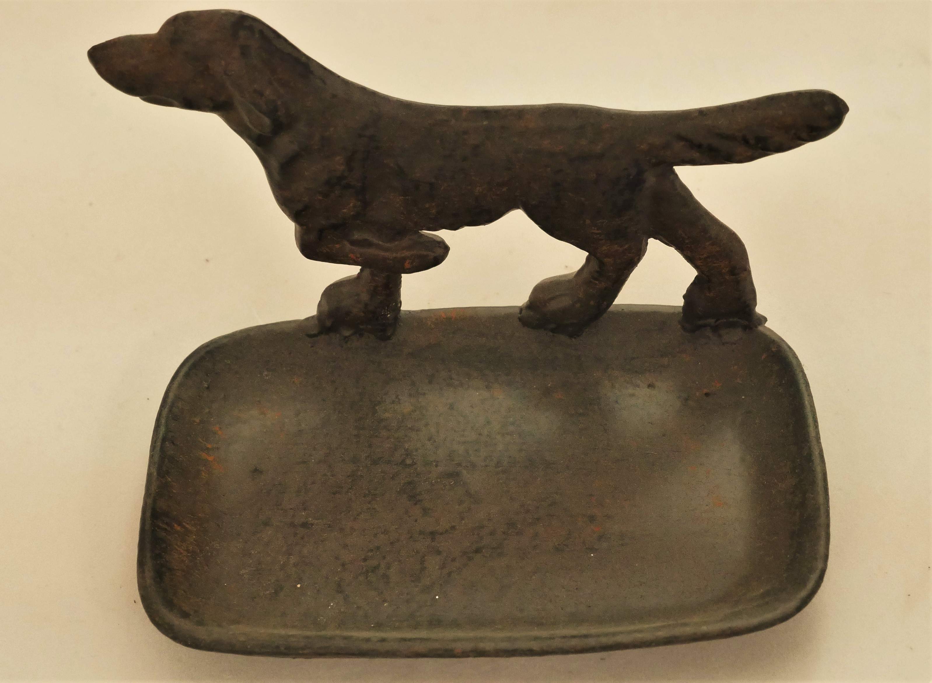 cast iron dog trinket dish.