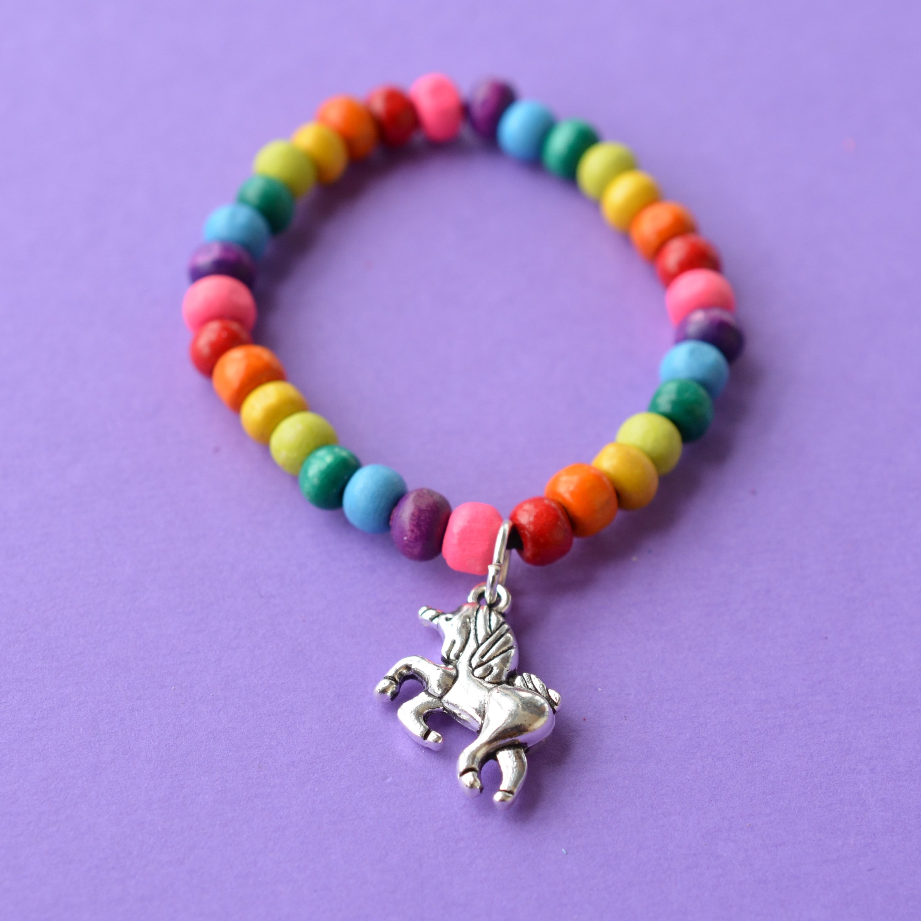 Colourful Child’s Wooden Bead Unicorn Charm Bracelet