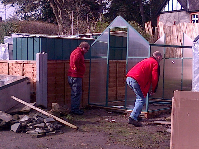 Putting up the greenhouse