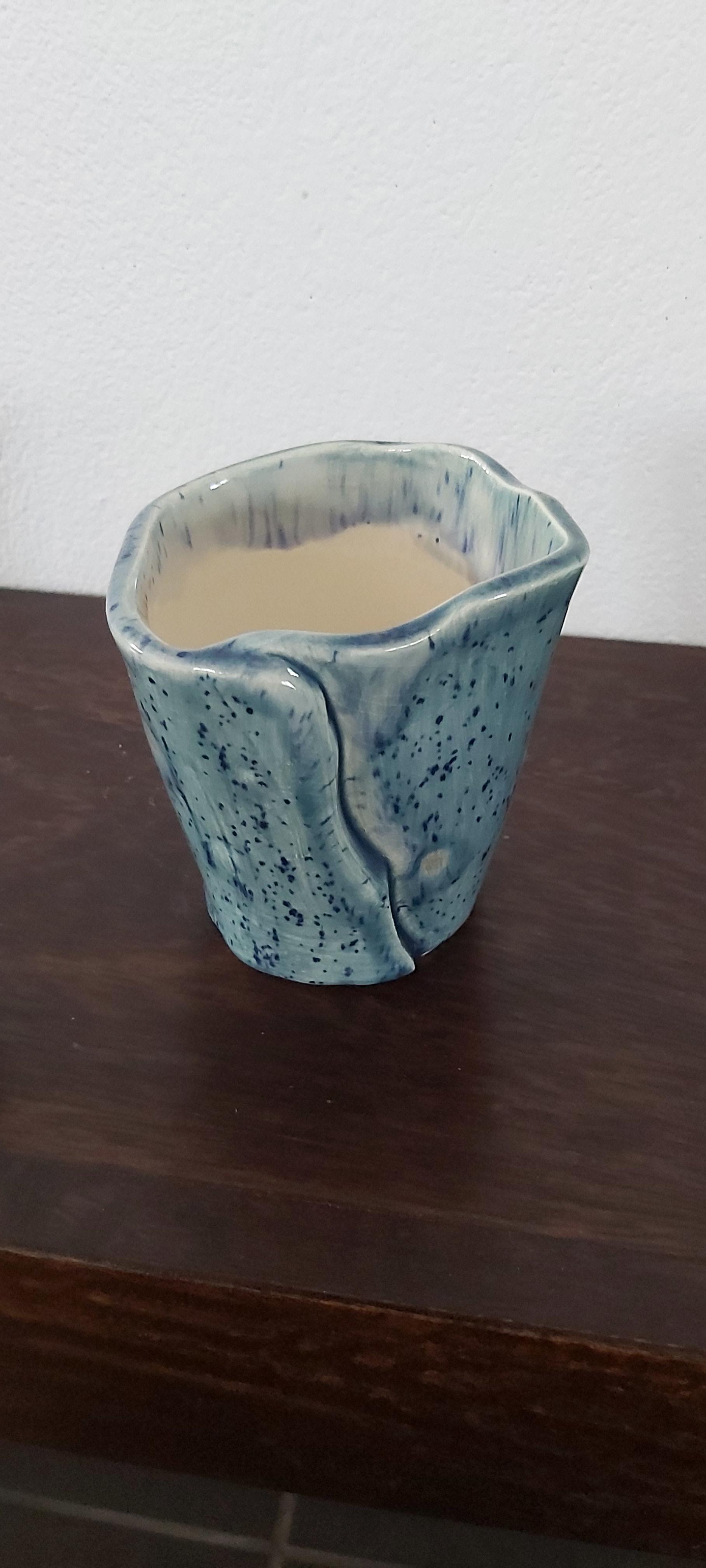 Porcelain pot with blue crystal glaze