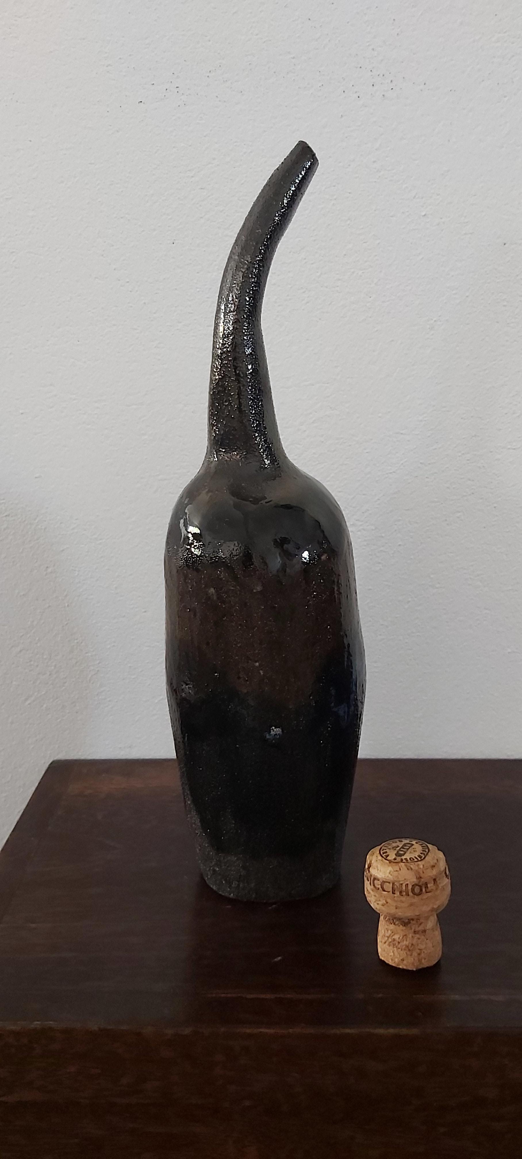 Chocolate brown clay bottle