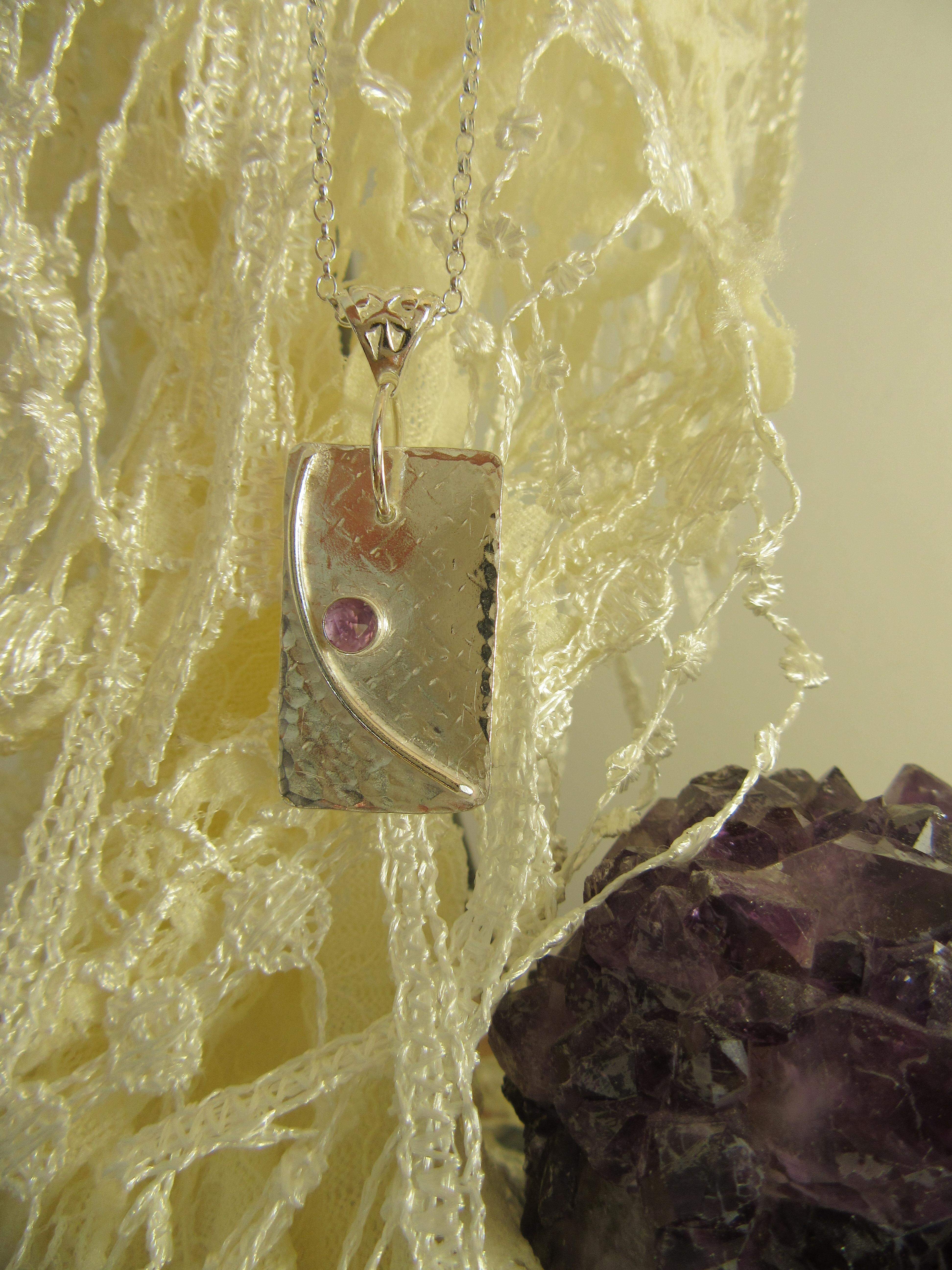 Silver moonshine with amethyst pendant