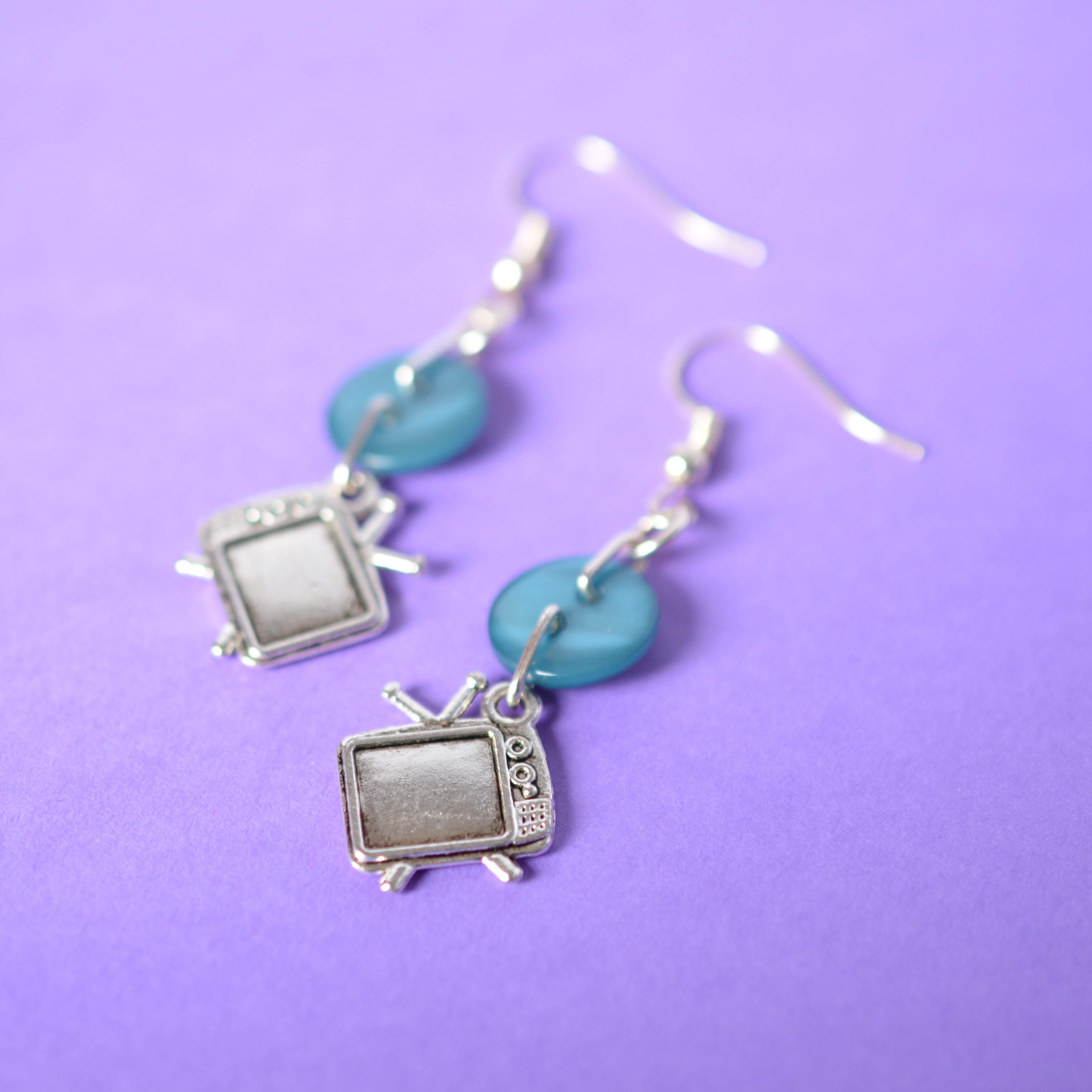 TV One Button Charm Earrings