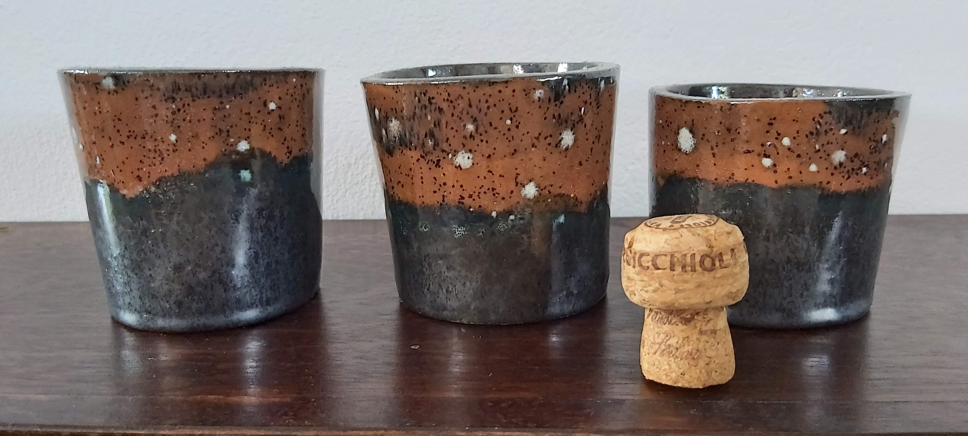 Set of three terracotta pots