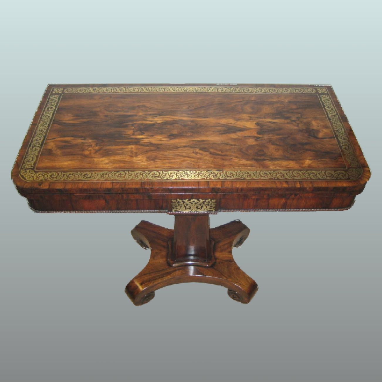 A 1830's rosewood table fully restored to bring out the beauty of the wood.