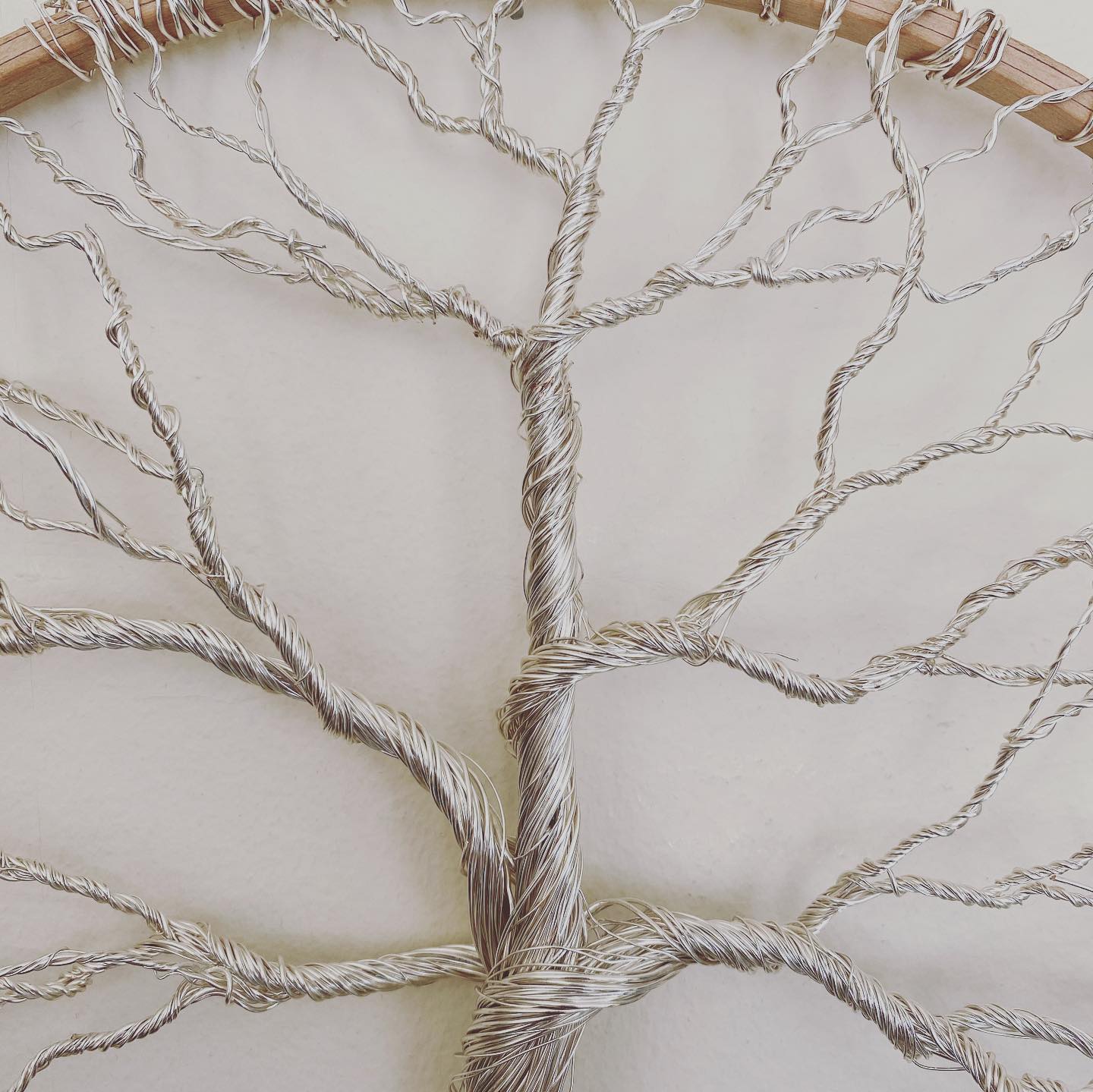Winter tree of life sculpture made with silver wire close up