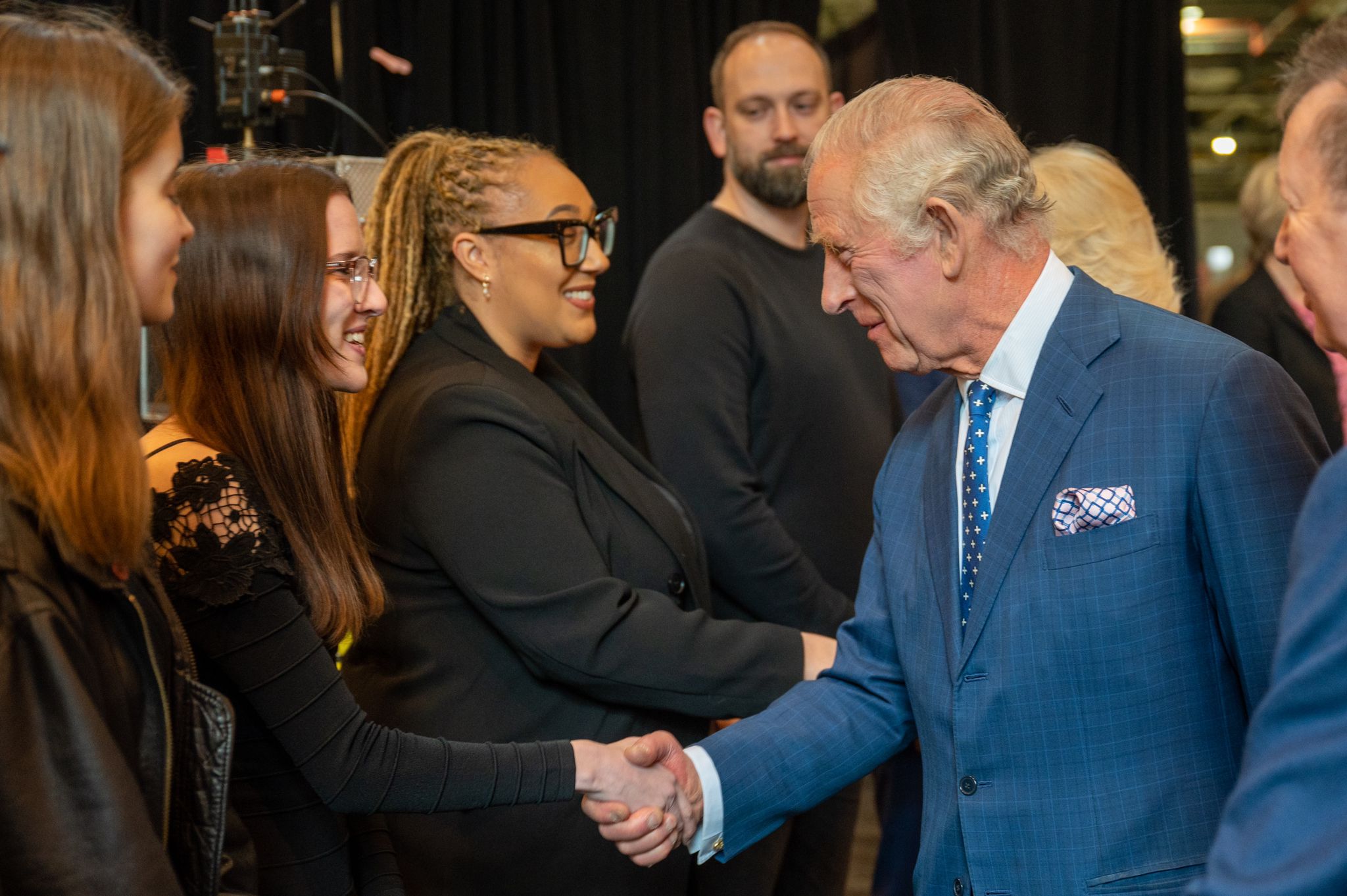 Megan Parry shaking hands with HRH King Charles lll and Adannae Okeke on Megan-s leftjpg