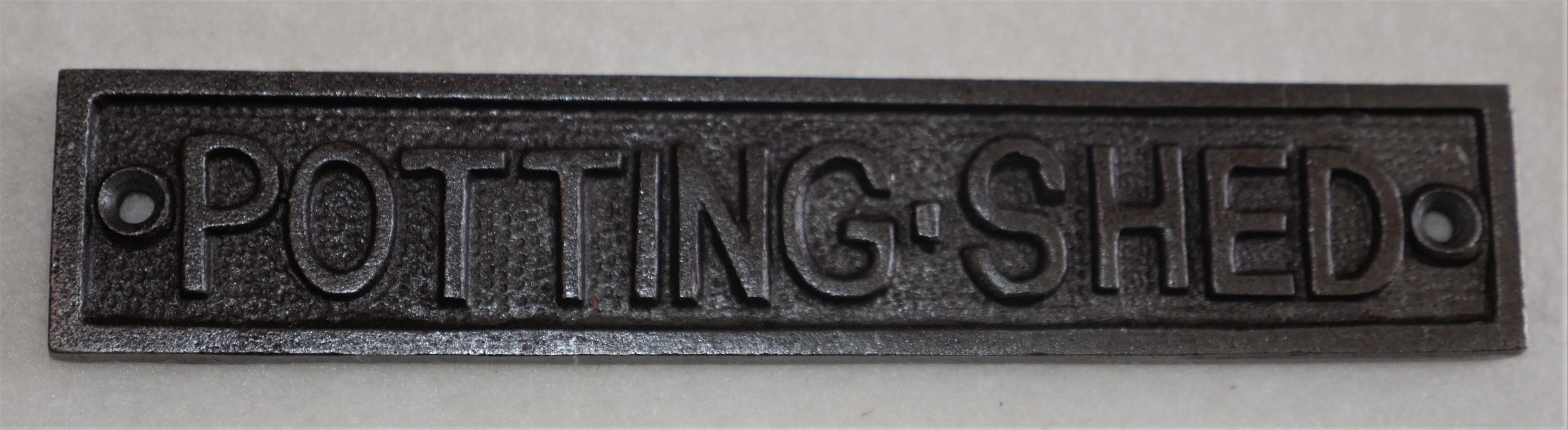 Cast iron Potting shed sign.