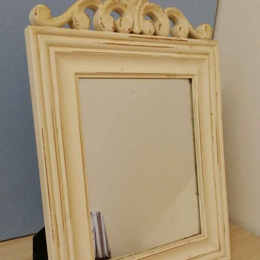 Mirror with distressed wood frame