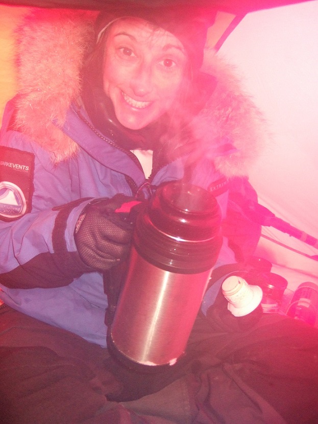 Claire pouring a nice warm brew inside the tent from her flask :)