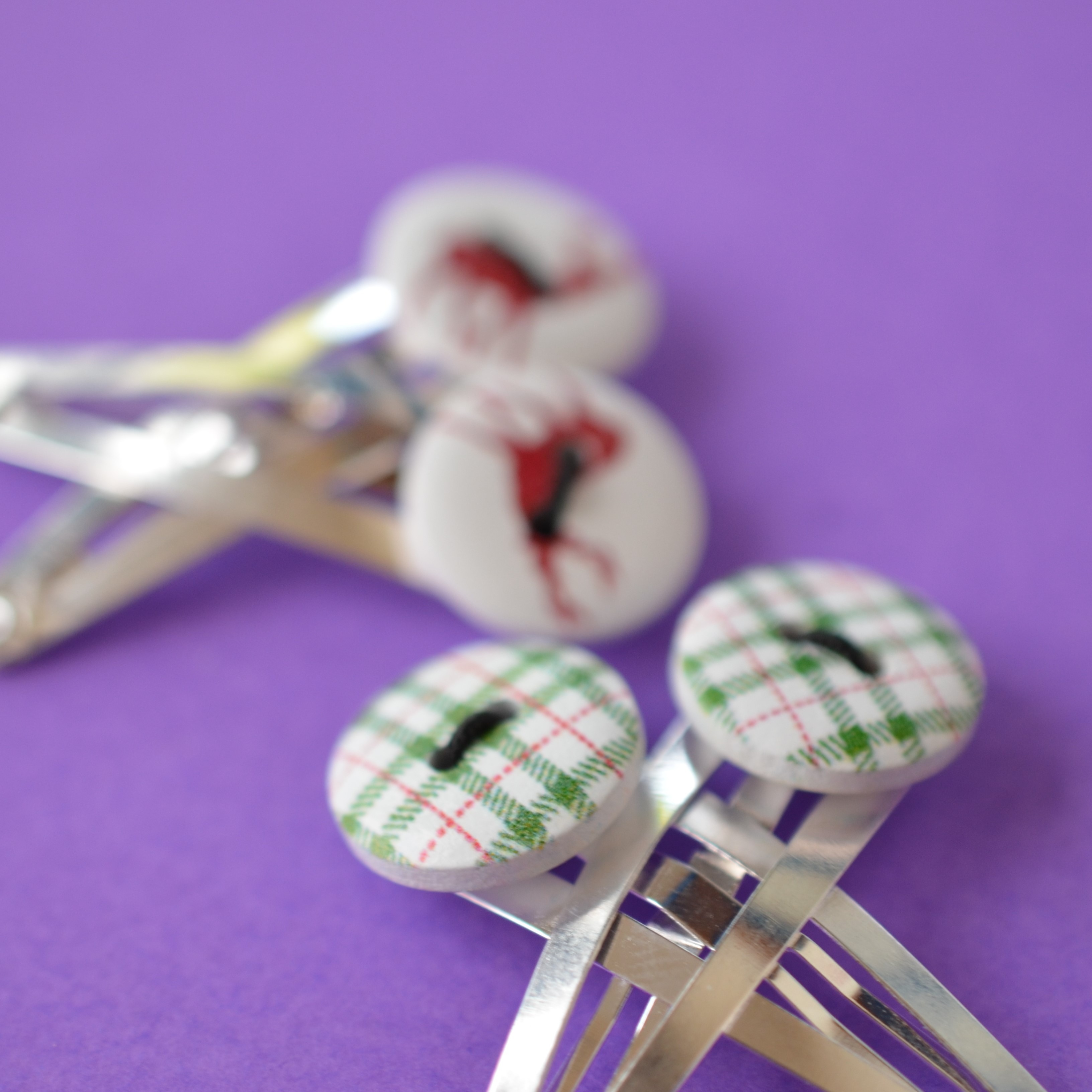 Two Pairs of Christmas Button Hair Clips with Reindeer and Green Tartan design