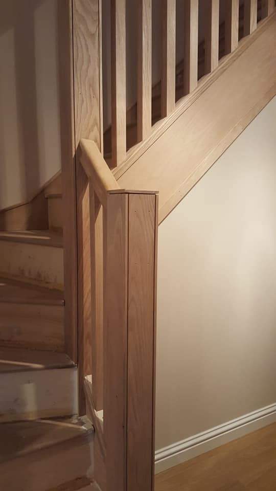 Wooden stair banister.